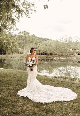 Long train of dress that she did an amazing job with the bustle