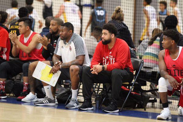 Coaches watching the action.