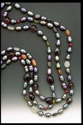 "Underwater Fantasy" triple strand fresh water pearls, 280.