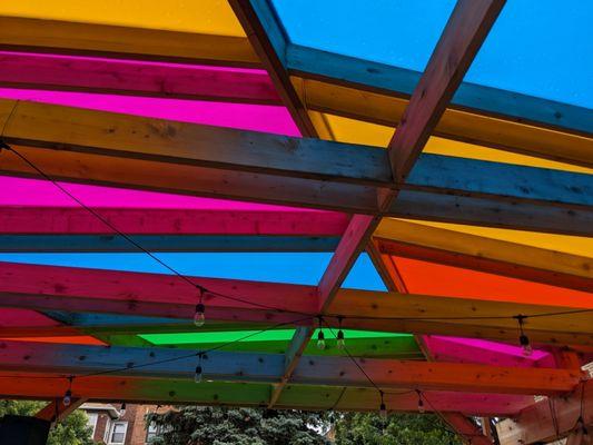 Vinyl wrapped roof sheathing on cedar pergola