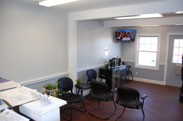 Our spacious and comfortable waiting room with FREE Wi-Fi, Coffee, Tea, Sodas, & Water.