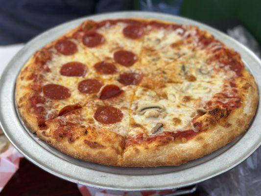 Large pizza with half pepperoni and half mushroom