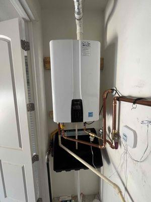 Tankless water heater install at residential home in Austin by Reliant Plumbing