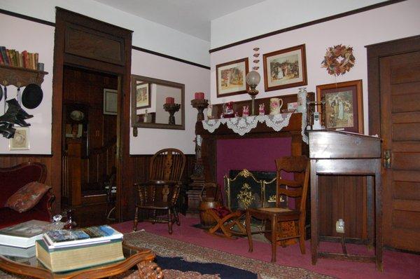 Parlor with working fireplace. Another common area.