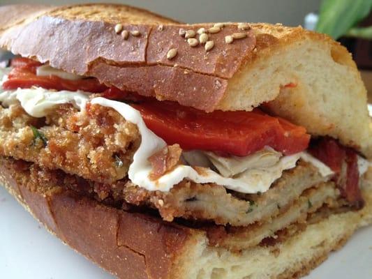 My wife's invention (and photo).   Sandwich with eggplant, artichokes, roasted red peppers, fresh mozz, and roasted red peppers.