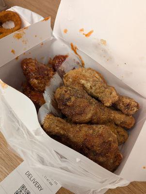 Drumsticks and wings combo (red sauce is hot honey spicy and pale sauce is honey lemon pepper). Each piece was so big!