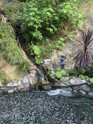 The koi pond (right side) and one of the other waterfalls.