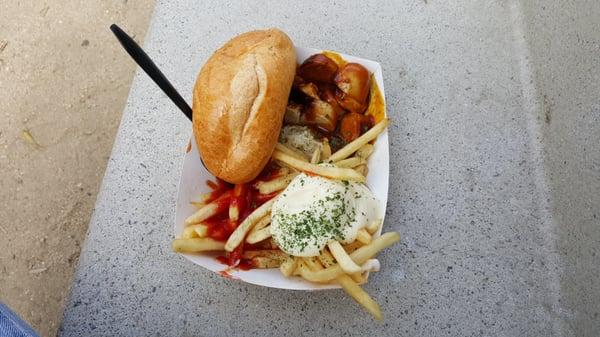 Munich combo, currywurst,fries and Sauerkraut