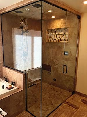 Frameless steam shower, with 1/2 glass.