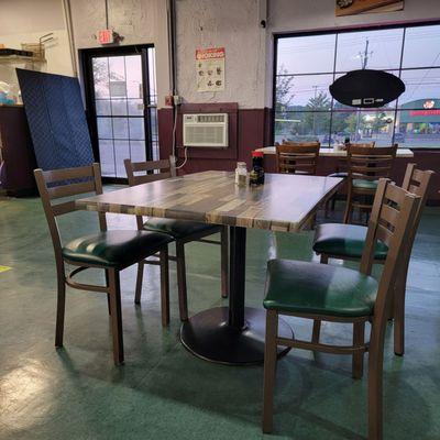 Table for four. clean dining area with well-separated tables