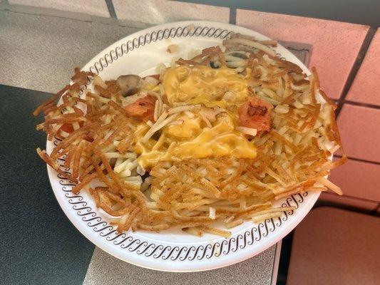 Hash-browns with Cheddar Cheese, Grilled Onions, Tomatoes, & Mushrooms