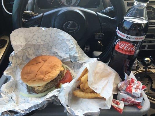 Bacon cheeseburger "all the way" with regular French fries and a Coke Zero.