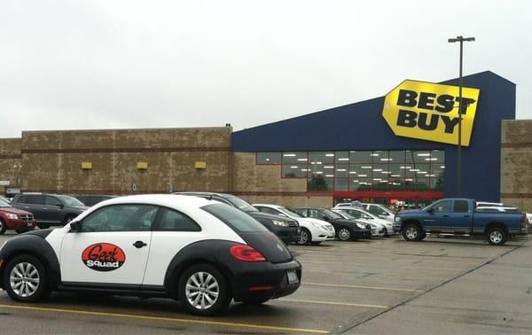 Exterior showing one of the Geek Squad VW cars.