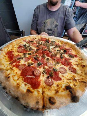 This pizza was deeeeeelish! The chopped meatballs, Basil and red sauce in every bite topping the perfect chewy bubbly crust.