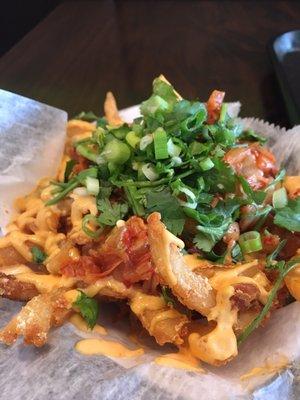 Joni's kimchi fries can probably bring peace to the world had everyone tried it.