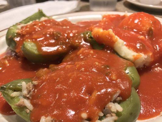 Stuffed peppers and mashed potatoes generously covered in tomato sauce. Yum!