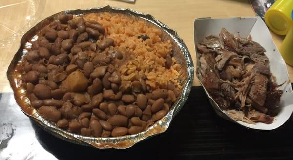 Yellow rice and bean with pernil