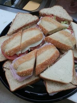 Party Trays customized with assorted sandwiches in regular and large sizes