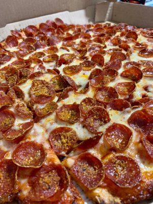 The business owner photo of the pepperoni pizza was legit. Our pizza looked the same.  #UpCloseSavor