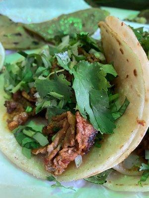 Carne enchilada tacos (pork in a pepper sauce)