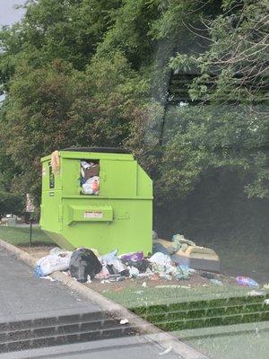 This dumpster sat like this over a week