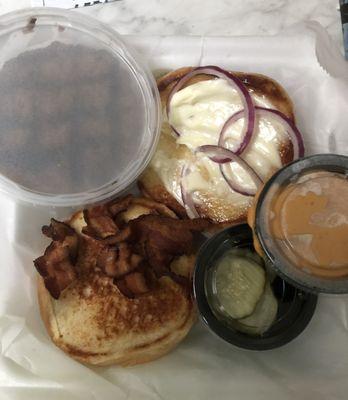 Chump's Burger with beer cheese, bacon, pickles, and onions.  Order came delivered in a build-your-own burger styrofoam container.