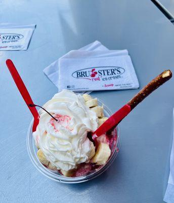 Banana split topped with pineapple, strawberry, butterscotch, and three scoops of fresh made ice cream