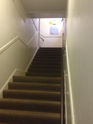 Go up these stairs to get to the studio.