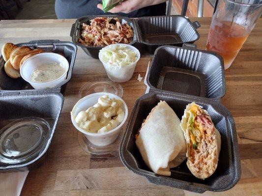 Pulled pork wrap, Macdaddy, spinach artichoke dip with pita bread, green chili Mac, Cole slaw, blackberry hard apple cider.