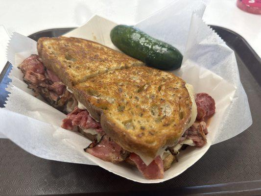 Corned beef and pastrami with Swiss cheese and cole slaw on rye...