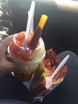 Diablito de mango with hot Cheetos and cheese