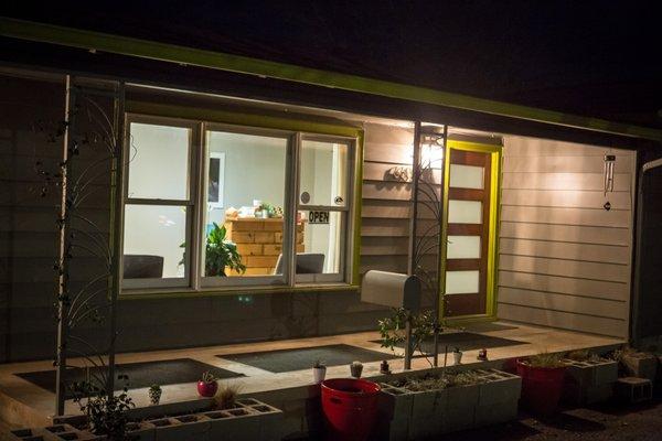 The little gray house with green trim- on Manchaca, between William Cannon and Stassney.