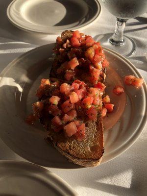 Bruschetta on table once you're seated.