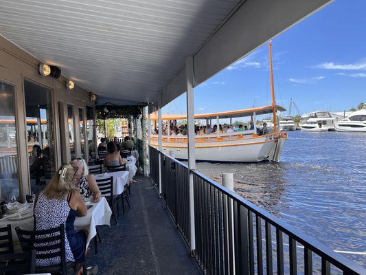 Outside sitting on the river.