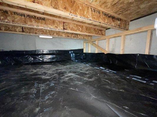 New vapor barrier install after crawlspace clean up and mold remediation.