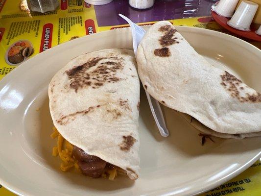 Carne guisada with cheese taco and Barbacoa taco