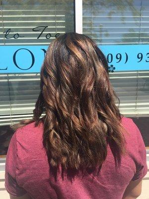 Balayage doesn't have to just be for blondes! This dark beauty added some Carmel to add movement to her hair.