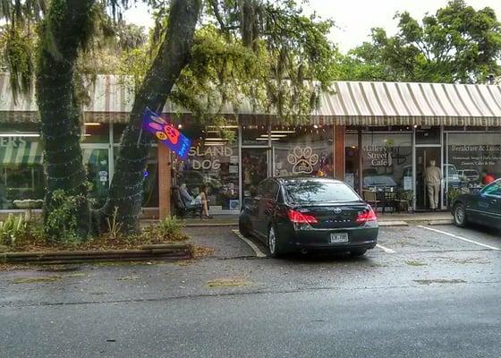 The front of the store and the parking area.