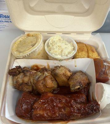 Mac n cheese, potato salad, corn bread, chicken wings and ribs.