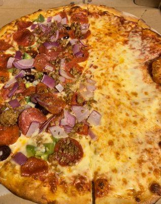 Half cheese & half pepperoni, sausage, Green Peppers, onions and olive.