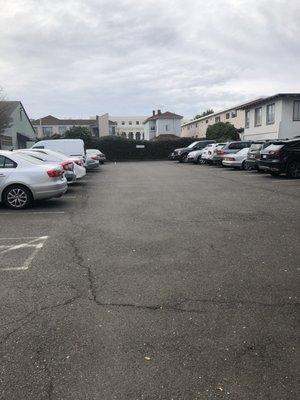 Full parking lot in back