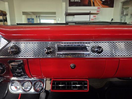 Clean vintage stereo installation on this classic car!