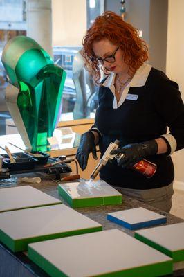 Encaustic artist Shari Lyon prepping for a live painting demonstration