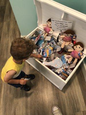 Happy Patient at treasure toy chest