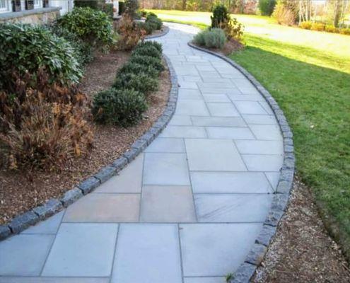 Flagstone walkway Cobblestone border/ approximately 70 ft.