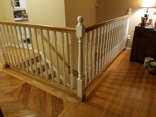 new bannister and entryway hardwood matching our old hardwood