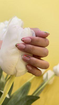 Best nail salon in Saugus! Flower designs on classic pink nails.