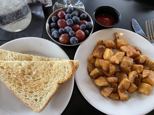 My side-order meal: sourdough toast, well-done home-fried potatoes & fresh fruit.