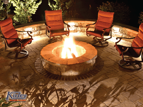 Unilock fire pit, patio and retaining wall.