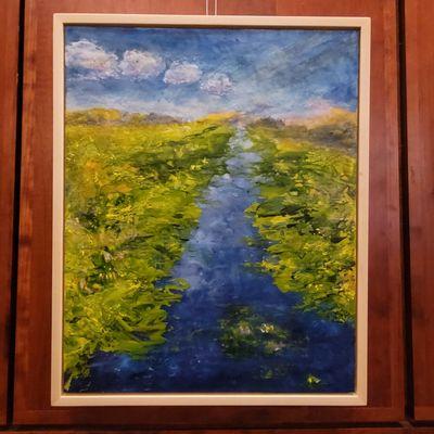 10/12/2023 - 'Wild Spaces' exhibit though out the lobby. 20 x 16 Encaustic on Panel by Linda Robertson, called 'Follow Me Home'.